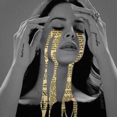 a woman holding her hands to her face with the word love spelled in gold on it