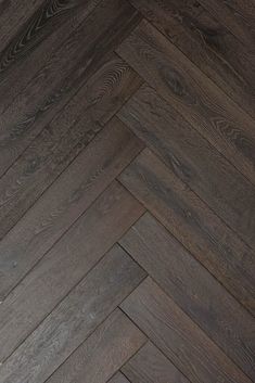 an image of wood flooring that looks like it is made out of herringbones