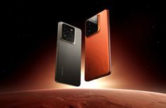 two red and black cell phones are flying over the earth in front of an orange background