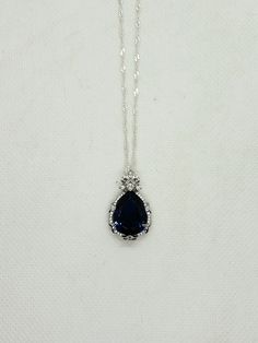 A beautiful blue sapphire surrounded by glittering white topaz accent stones set in sterling silver. Necklace Sapphire, Blue Sapphire Necklace, Sapphire Necklace, Sapphire Stone, White Topaz, Stone Settings, Beautiful Blue, Sterling Silber, Pendant Necklaces