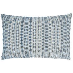 a blue and white pillow on a white background