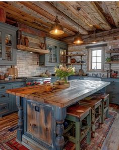 a rustic kitchen with an island in the middle