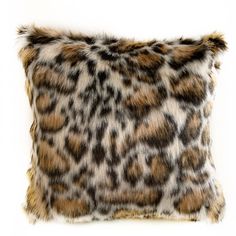 an animal print pillow with fur on it's sides and the bottom part of the pillow