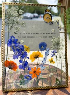 a card with flowers and a butterfly on it