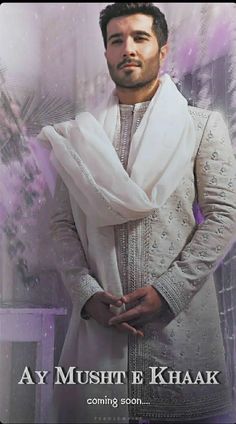 a man wearing a white outfit and standing in front of a purple background with the words ay musht e khaak coming soon