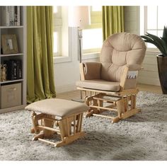 a rocking chair and ottoman in a living room