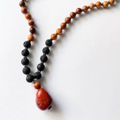 Feelings Of Gratitude And Benevolence Rely On Awareness And Acceptance Of What Is, Which Is Why This Grounding Necklace Has Been Designed To Help You Establish Presence By Reconnecting With The Earth. Lava Rock Beads Will Help Balance Negative Emotions, While Wood Yes Beads Will Encourage You To Find Peace In The Mystery And Uncertainty Of Life. A Stunning Red Jasper Pendent Will Help Open Your Root Chakra So That You Can Be Fully Open To Receiving. Material: Red Jasper, Yew, & Lava *Stone Shape Open To Receiving, Find Peace, Lava Rock, Root Chakra, Negative Emotions, Lava Stone, Red Jasper, Finding Peace, The Earth