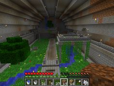 the inside of a minecraft building with lots of green plants and trees in it