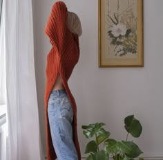 Ready to Ship. Handknit Asymmetric Turtleneck Sweater with Wide Sleeves. Chunky Knit with Extra Long Sleeves in Terra. Long Knit Cheap Layering Sweater, Loft Turtleneck Sweater, Sweaters With Wide Sleeves, Long Orange Sweater, Long Dark Orange Sweater, Long Luxury Hand-knitted Sweater, Long Sweaters Nordstrom, Cheap Oversized Knit Top For Fall, Bohemian Long Sleeve Sweater