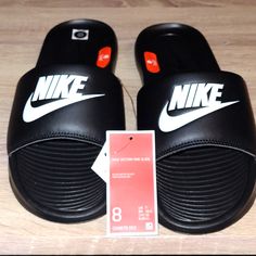 Nike Unisex Slides With Enhanced Comfort Black Nike Sneakers With Logo Print, Black Slip-on Sneakers For Leisure, Black Non-slip Slides For Leisure, Nike Casual Training Slides, Nike Casual Slides For Streetwear, Casual Training Sneakers For Summer, Black Slides For Leisure In Spring, Black Non-slip Sneakers For Summer, Synthetic Sneakers For Summer Training