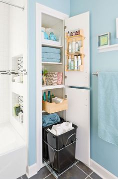 the bathroom is clean and ready to be used as a storage area for towels, toiletries and other items