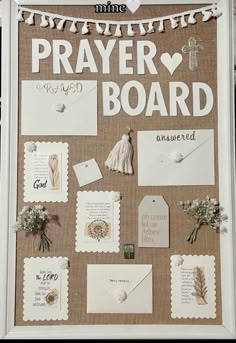 a bulletin board is decorated with white paper and some words on it that read, prayer board