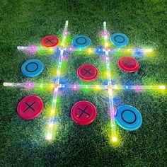 lighted tic - tac - toe game on the grass