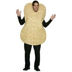 a man is dressed in a costume that looks like a guitar pickle, and has his hands out