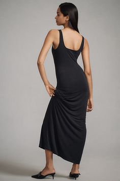 59% polyester, 32% viscose, 9% elastane Pullover styling Machine wash Imported | Knit Slip Dress by Anthropologie in Black, Women's, Size: XS, Polyester/Viscose/Elastane Knit Slip Dress, Knit Maxi Dress, Maxi Knit Dress, Fitted Silhouette, 50 Fashion, Guest Dresses, Square Neckline, Pullover Styling, Simple Design