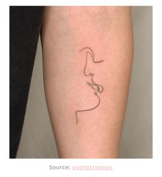 a woman's leg with a line drawing on it