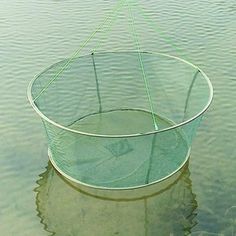 a fishing net sitting in the water