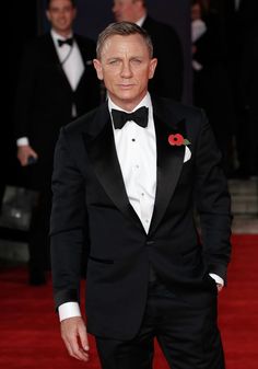 an older man in a tuxedo and bow tie at the royal albert awards