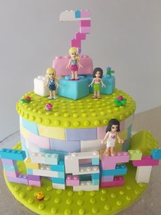 there is a cake made to look like it has legos on top of it