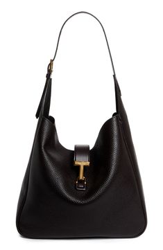 Signature T-shaped hardware adds a heritage touch to this slouchy hobo bag masterfully crafted in Italy from beautifully grained calfskin leather. Hook-tab closure Shoulder strap Leather Made in Italy Designer Handbags Uni Bag, Tom Ford Leather, Slouchy Hobo Bag, Leather Hobo Bags, Tom Ford Bag, Large Hobo Bag, Rollerball Perfume, Leather Hobo Bag, Handbag Straps