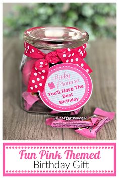 a pink themed birthday gift in a jar with the words, fun pink themed birthday gift