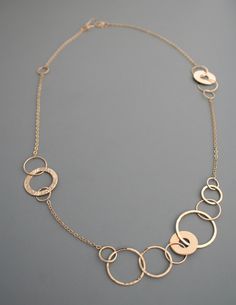 "This stunning asymmetric necklace has such a fun and modern look to it. It is completely crafted by hand from 14k gold filled metal. The links have a shiny finish which makes the necklace sparkle in the light as you move. The total length is about 25\" and the links measure between 1/4\" and 1\" wide. The chain ends in my signature handmade clasp.  Rachel Wilder Jewelry is all handmade solely by the artist. I create my designs by hand starting with straight wire which I shape, fuse, hammer and Gemstone Pendant Jewelry, Gold Filled Necklace, Pewter Pendant, Infinity Necklace, Handmade Jewelry Designs, Message Jewelry, Valentines Necklace, Accessories Diy Jewelry, Unique Handmade Jewelry