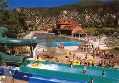 a large water park with people playing in it