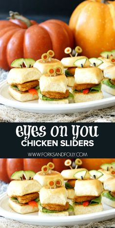 two white plates with sandwiches on them and pumpkins in the background, one has eyes on you chicken sliders