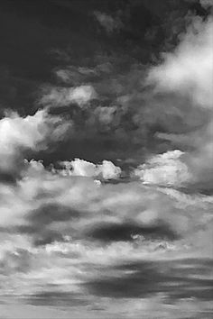 black and white photograph of clouds in the sky