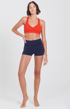 From hot yoga to a jog in the sunshine, these shorts will never let you down. Waistband option to roll down or wear high. Soft 4 way stretch fabric deliver great comfort and versatility! 92% Cotton, 8% Lycra. Made in USA. Hand Dyed. Outer Seam: 25.5"Colors: Navy, Black, Stella Blue Model is 5'9," size 4, and wearing a size small. Shown with the Raja Bra Versatile Athletic Shorts For Summer Gym, Versatile Summer Gym Athletic Shorts, Navy Activewear With Built-in Shorts For Training, Versatile Summer Athletic Shorts For Sports, Navy Activewear With Built-in Shorts For Sports, Navy Activewear With Built-in Shorts For Gym, Versatile 4-way Stretch Athletic Shorts For Gym, 4-way Stretch Sports Shorts, Navy Athleisure Activewear With Built-in Shorts