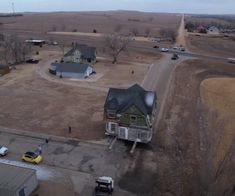 an aerial view of a house in the middle of nowhere