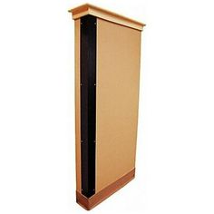 a tall wooden cabinet sitting on top of a white wall