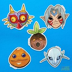 four stickers with different avatars on them, one has an alien face and the other has a pineapple