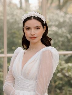 A stunning bridal headband, featuring intricate handcrafted white clay flowers and white Czech seed beads; delicately woven into a fine silver or gold wire band, giving it an elegant yet timeless feel. A beautiful, unique accessory designed and handmade in Canada. The metal jewellery wire is tarnish-resistant, so you can be sure your Athena Headband will look as stunning as ever season after season. It also comes in two amazing colours - White/Gold and White/Silver - so you can choose the one th White Summer Wedding Headband, White Spring Wedding Headband, Elegant Handmade Flower Wedding Headband, White Adjustable Bridal Headband, Flower Girl Wedding Hair, Elegant White Flower Headband, Bridal Flower Headband, Headpiece Flower, Flower Girl Wedding