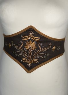 "The Hungarian Garden" Do you like corsets but also like to feel comfortable in your clothes? This belt is made for you! This is an embroidered elastic waist cincher, made of quality linen. Steel stays on the front of the belt provide support and give the illusion that it is a real corset. The robust elastic that makes up the back of this accessory allows greater sheathing than a classic belt and will adapt perfectly to your size. The embroidered pattern was created in our workshop for this uniq Leather Waist Cincher, Cincher Belt, Classic Belt, Corset Belt, Embroidered Linen, Fashion Project, Couture Sewing, Waist Cincher, Fabric Belt