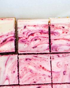 four squares of pink and white swirled soap