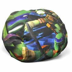 a colorful bean bag sitting on top of a white floor