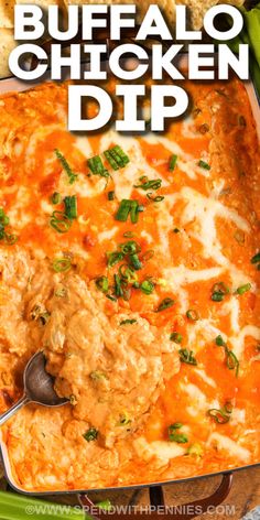 a casserole dish filled with buffalo chicken dip