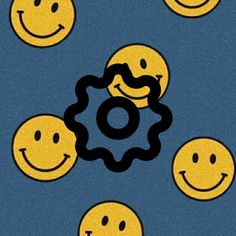 a bunch of yellow smiley faces with a black ring in front of them on a blue background