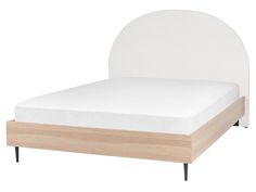 a bed with a white headboard and wooden foot board on top of it, against a white background