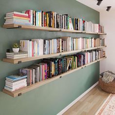 the bookshelves are filled with many different types of books