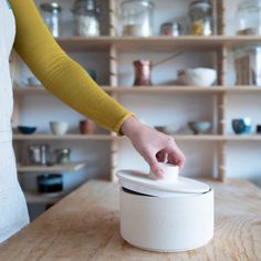 The ceramic food container is handmade in Slovenia on a spindle from natural-coloured chamotte clay and is surrounded by a matt white glaze on the inside. It is designed to store flour, cereals, or other foods that need to be stored in a dark place. The container is double-fired, resistant to crumbling and therefore everlasting. It is suitable for storing a good kilo of flour, and there are three different container shapes, all dishwasher safe. The container is not airtight and is not glazed on Flour Storage, Jar Tea, Countertop Oven, Bread Storage, Ceramic Jars, Dark Places, Different Textures, White Glaze, Food Containers