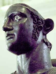 a close up of a statue of a man's head