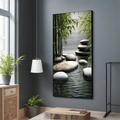 a living room scene with focus on the water and rocks in the foreground as well as bamboo trees