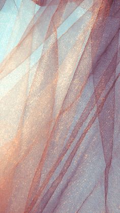 an abstract photo of pink and blue fabric