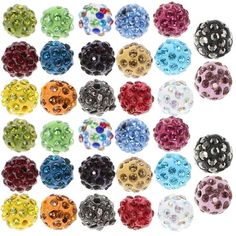 lots of different colored beads on white background