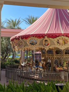 a merry go round in the middle of a park