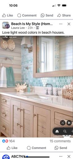 the bathroom is decorated in shades of blue and white, with an ocean themed tile backsplash