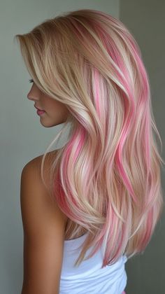 Rock a pink orchid ombre that beautifully complements tan skin. Visit our page for tips on achieving this stunning style. Save this pin for ombre inspiration! Tags: #PinkOrchidOmbre #HairColor #TanSkin Blond To Pink Hair, Alexa Bliss Hair, Blonde Hair With A Pink Streak, Blonde Hair Color With Pink, Pink Highlights Underneath Hair, Blond Hair Pink Highlights, Blond With Pink Highlights, Fun Hair Color Ideas For Summer, Pink Hair Streaks Blonde