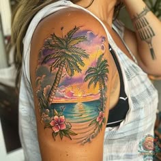 a woman with a palm tree tattoo on her arm